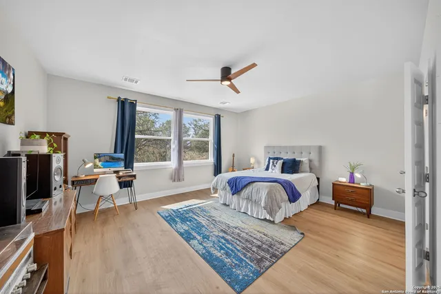 a bed room with a bed and a couch