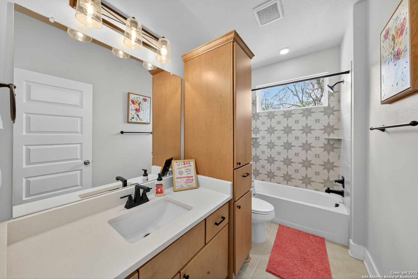 558 County Road 7713 Devine, TX 78016 - Photo 21 of 33 a bathroom with a sink a toilet and shower