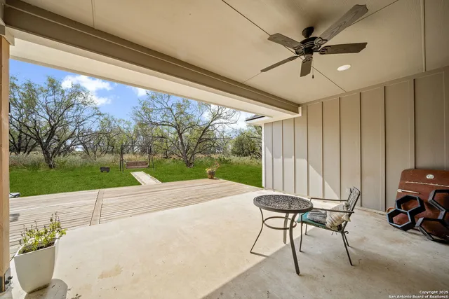 a aerial view of a house with a yard