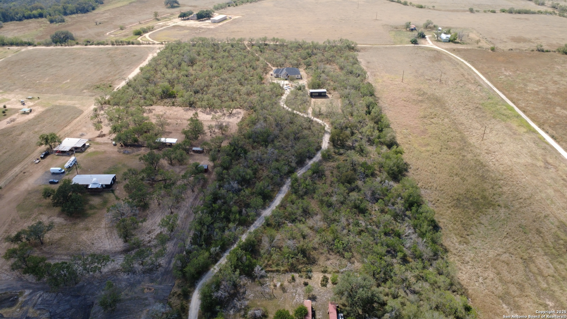 558 County Road 7713 Devine, TX 78016 - Photo 5 of 33 a view of a city