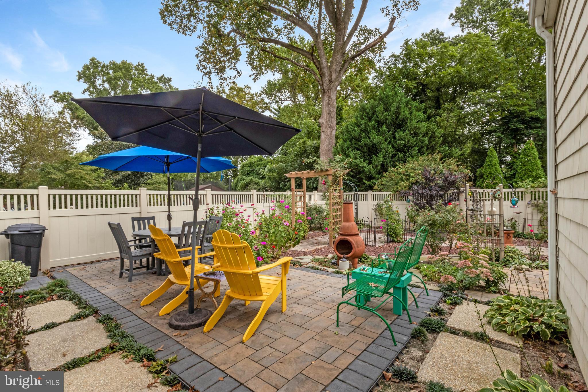 38 Read Street Seaford, DE 19973 - Photo 40 of 50 an outdoor space with furniture and umbrella