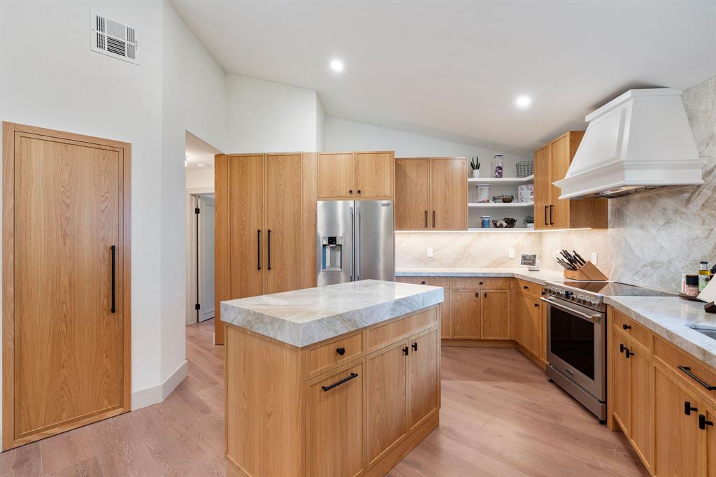 700 Old Nob Hill Road Plantation, FL 33324 - Photo 12 of 57 a kitchen with a sink stove and refrigerator