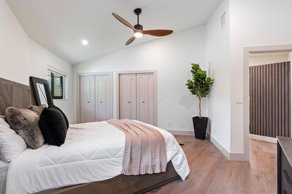 700 Old Nob Hill Road Plantation, FL 33324 - Photo 27 of 57 a bedroom with a bed a window and a potted plant