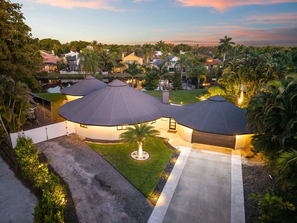 700 Old Nob Hill Road Plantation, FL 33324 - Photo 3 of 57 an aerial view of residential houses with outdoor space