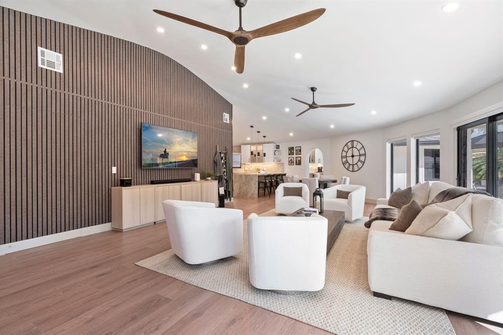 700 Old Nob Hill Road Plantation, FL 33324 - Photo 5 of 57 a living room with furniture and a wooden floor