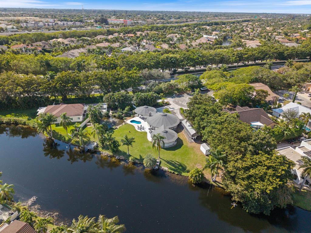700 Old Nob Hill Road Plantation, FL 33324 - Photo 56 of 57 an aerial view of lake and residential houses with outdoor space