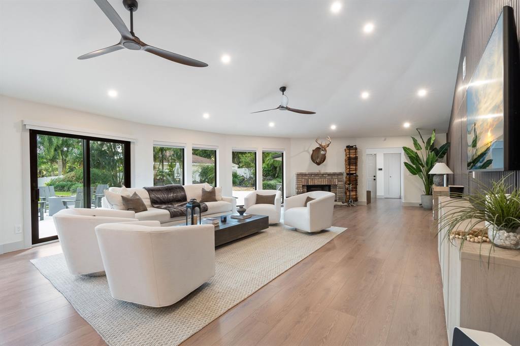 700 Old Nob Hill Road Plantation, FL 33324 - Photo 6 of 57 a living room with furniture and a large window