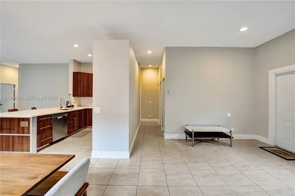 a view of kitchen with stainless steel appliances cabinets and a counter top space