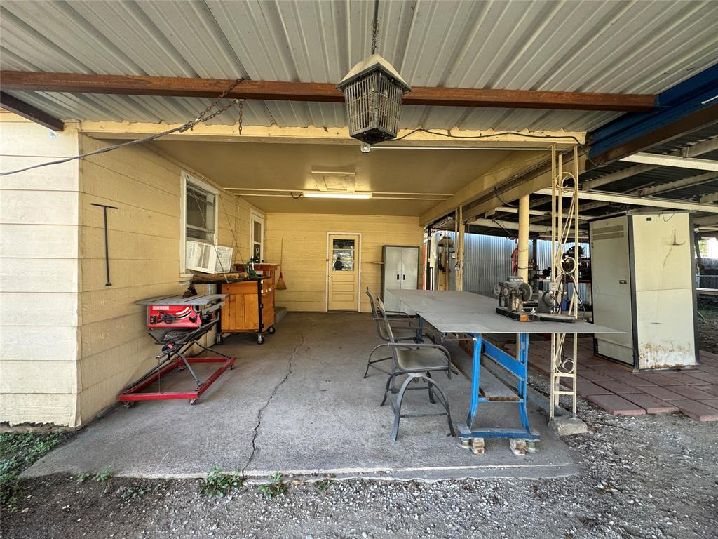 205 College Street Chico, TX 76431 - Photo 28 of 40 View of patio featuring outdoor dining space