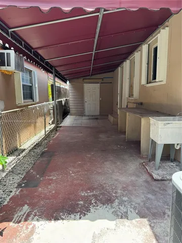 a view of a back yard of the house