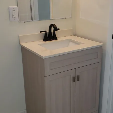 a bathroom with a bathtub and shower