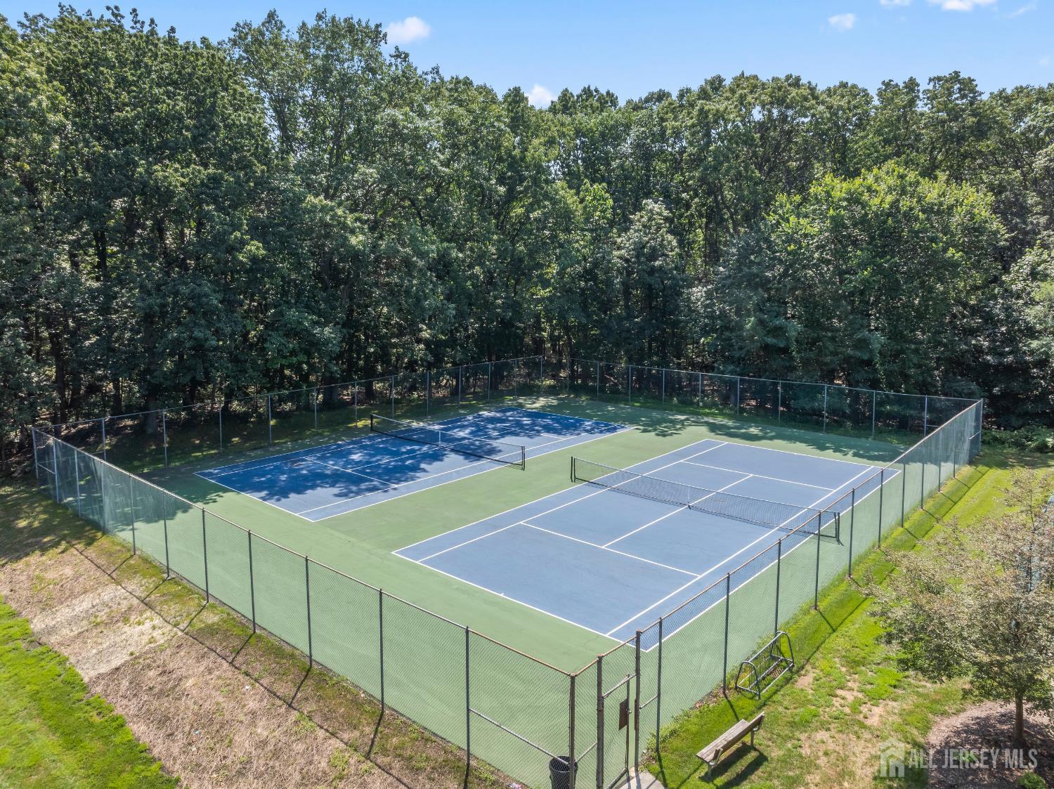 161 Applegate Lane East Brunswick, NJ 08816 - Photo 11 of 12 a view of a tennis court with sitting area