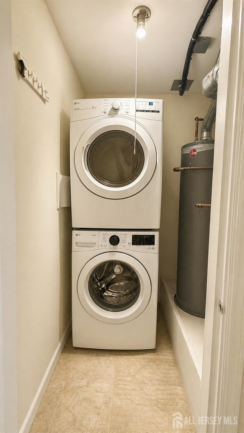 161 Applegate Lane East Brunswick, NJ 08816 - Photo 9 of 12 a utility room with dryer and washer