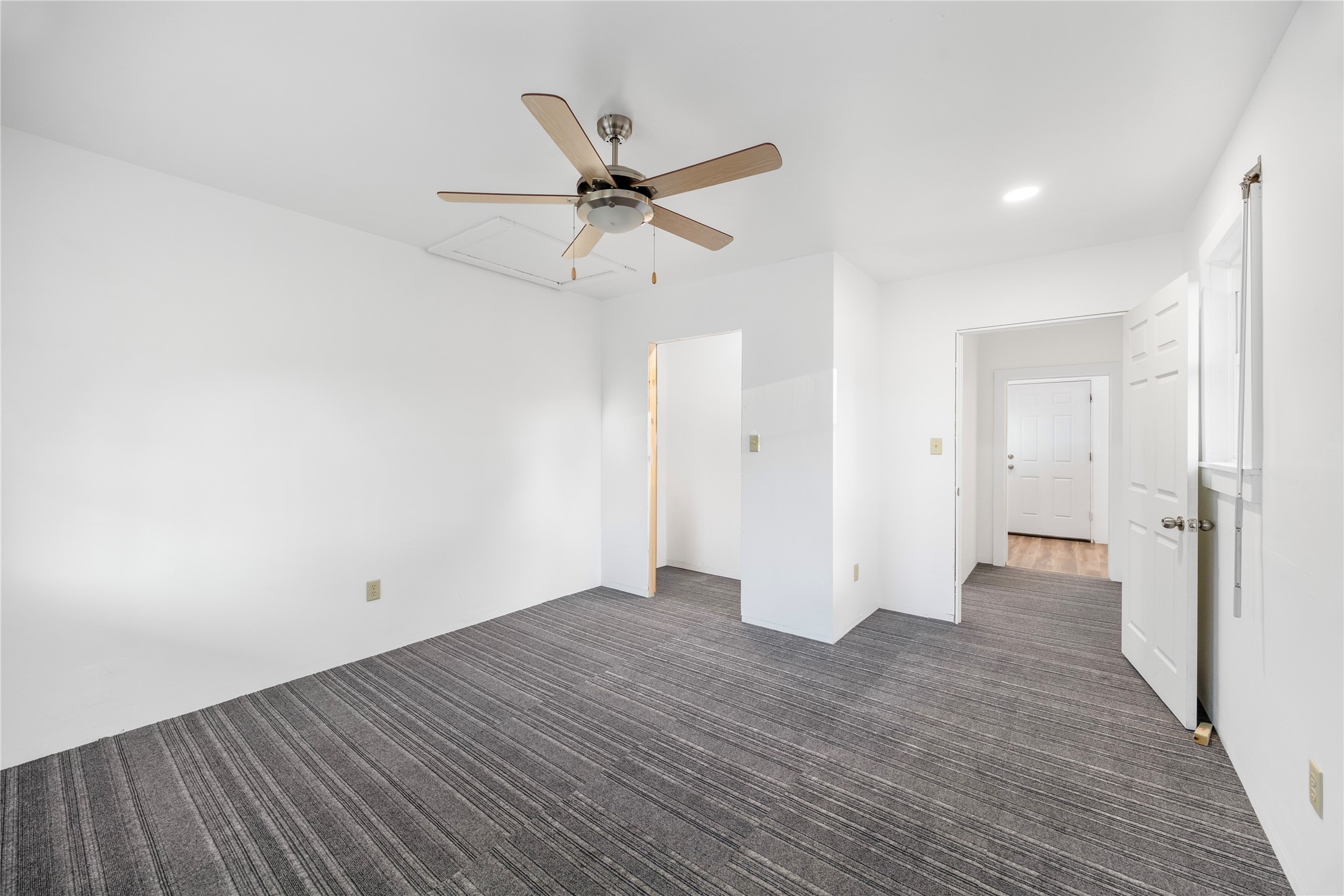 1324 Fair Drive Angleton, TX 77515 - Photo 23 of 42 wooden floor in an empty room with a window