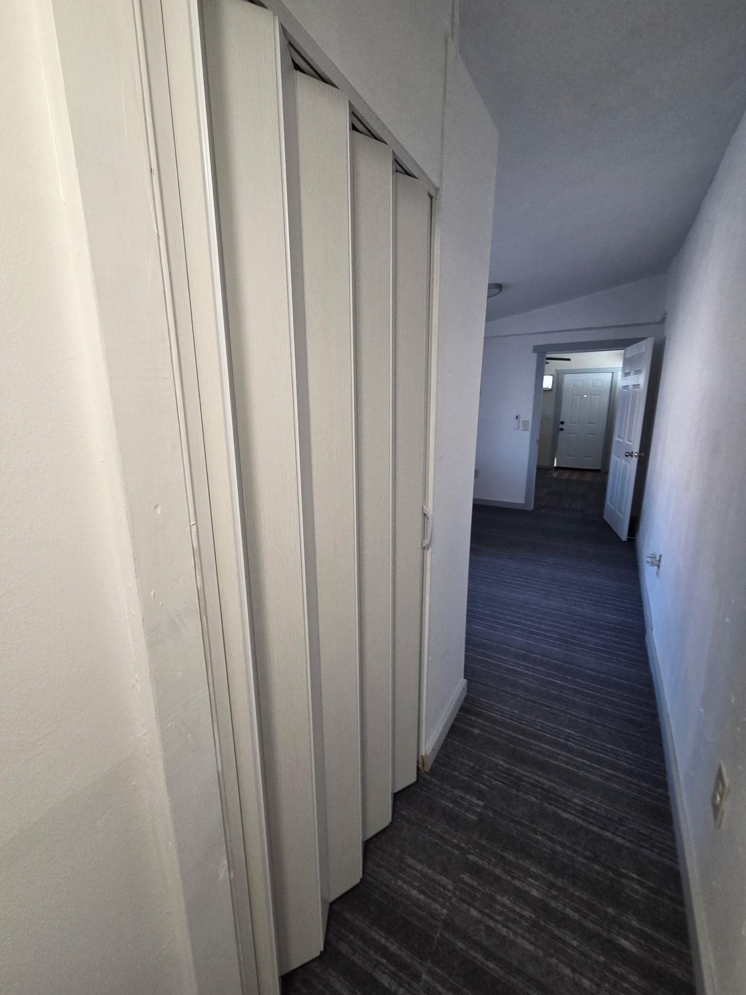 1324 Fair Drive Angleton, TX 77515 - Photo 29 of 42 a view of a hallway with wooden floor