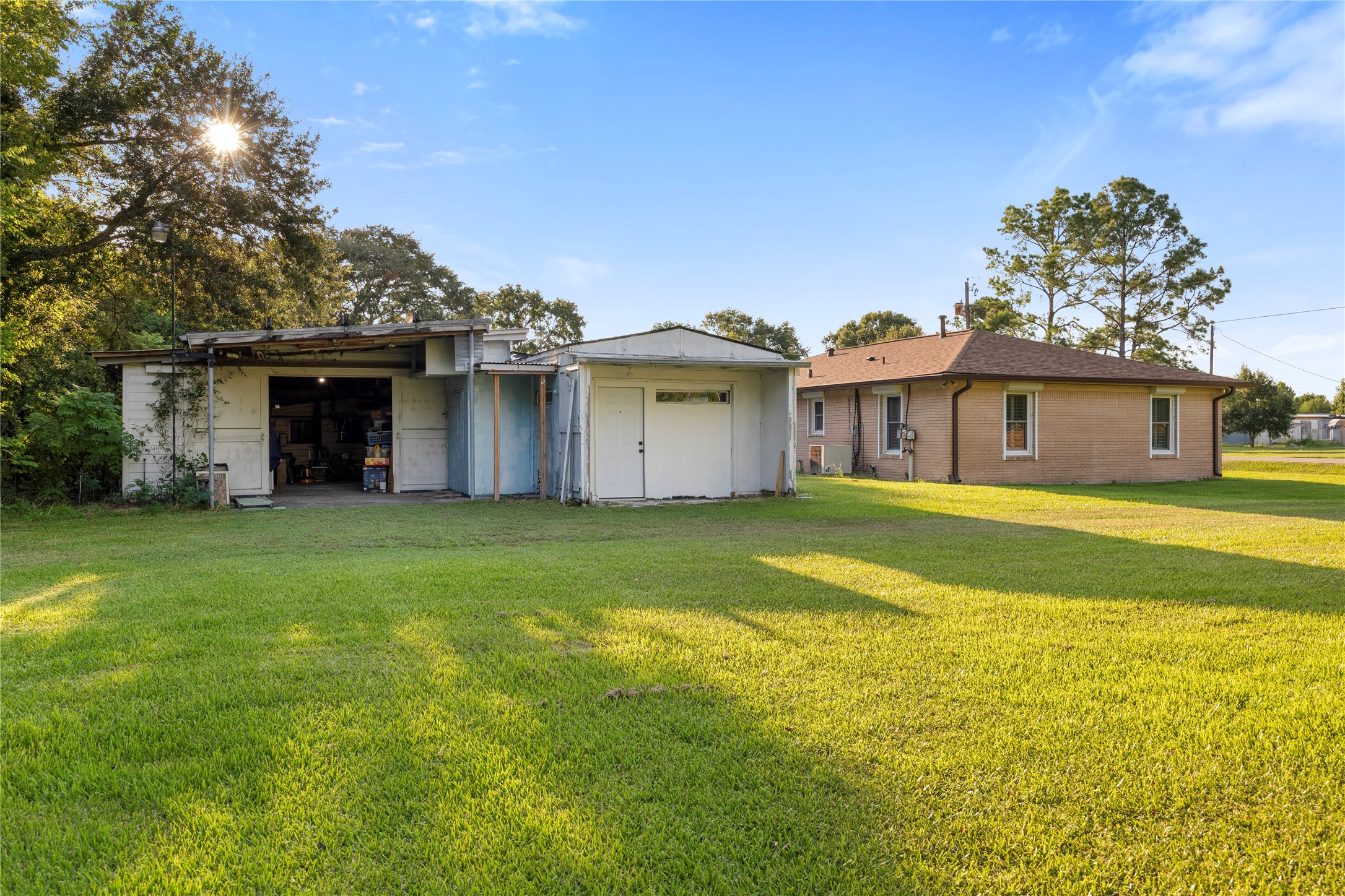 1324 Fair Drive Angleton, TX 77515 - Photo 6 of 42 a front view of a house with garden