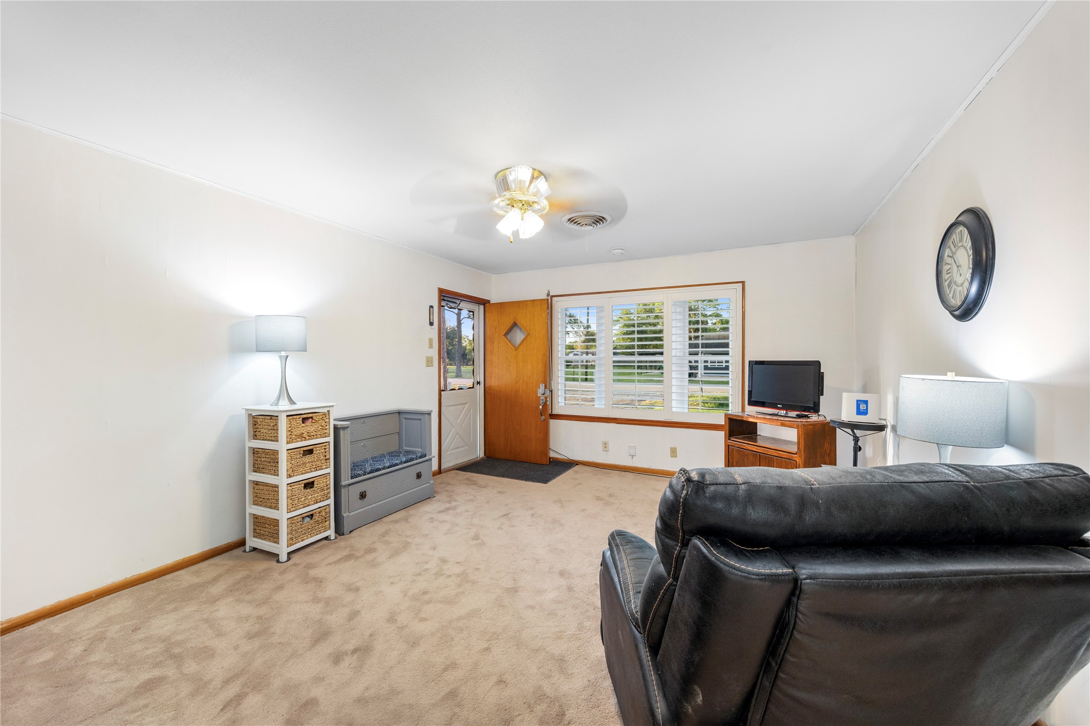 1324 Fair Drive Angleton, TX 77515 - Photo 7 of 42 a bedroom with furniture and a window