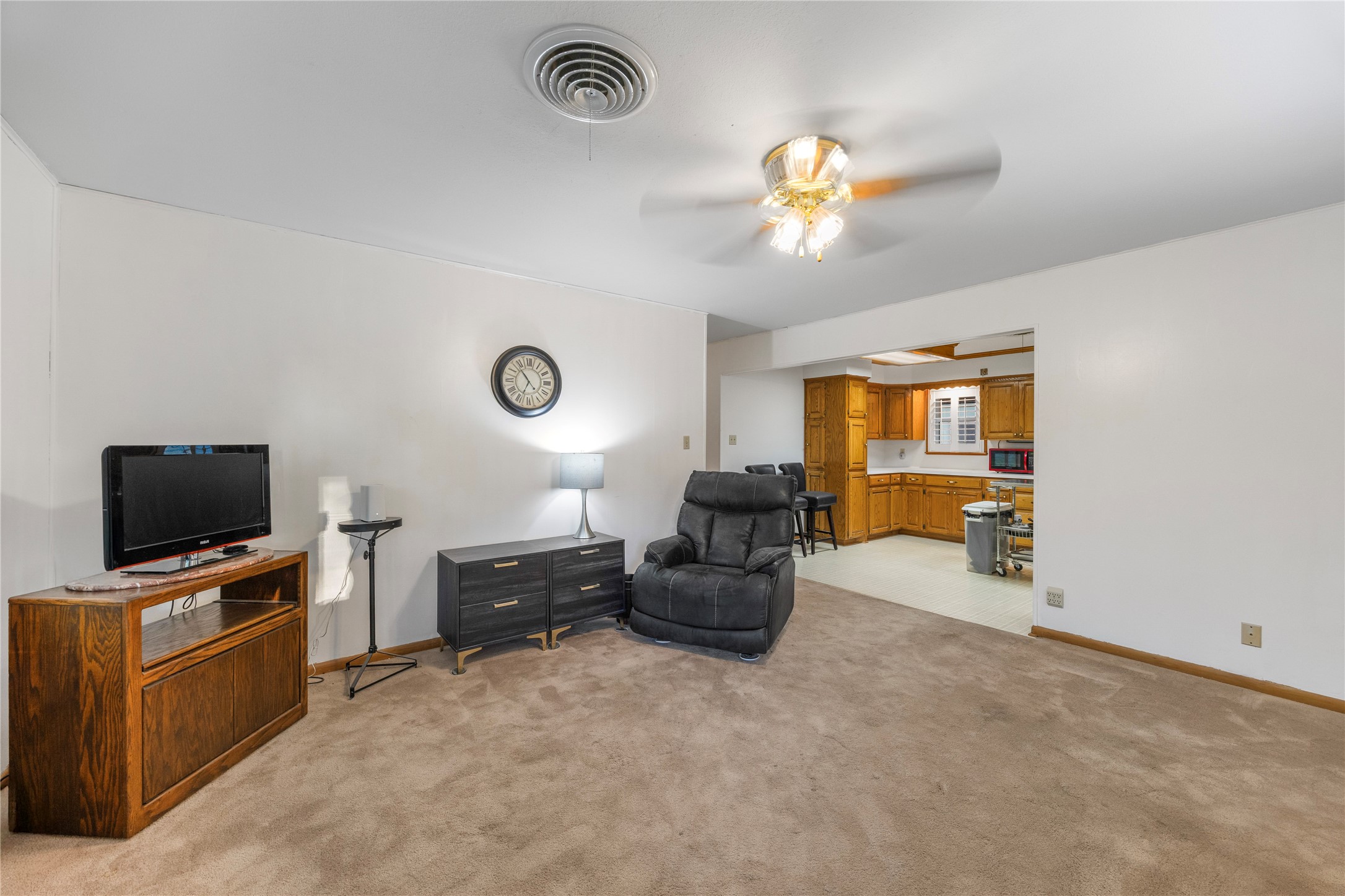 1324 Fair Drive Angleton, TX 77515 - Photo 8 of 42 a living room with furniture and a flat screen tv