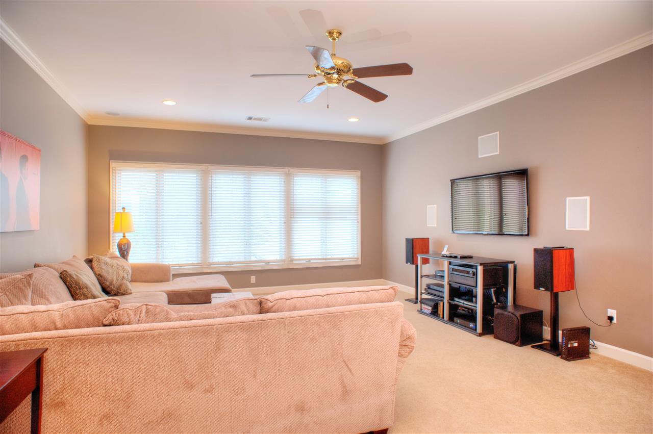 195 Waring Road Memphis, TN 38117 - Photo 22 of 25 23x16 MEDIA ROOM with Built-In Speaker System, Sink and Mini Fridge Bar and Custom Built-Ins