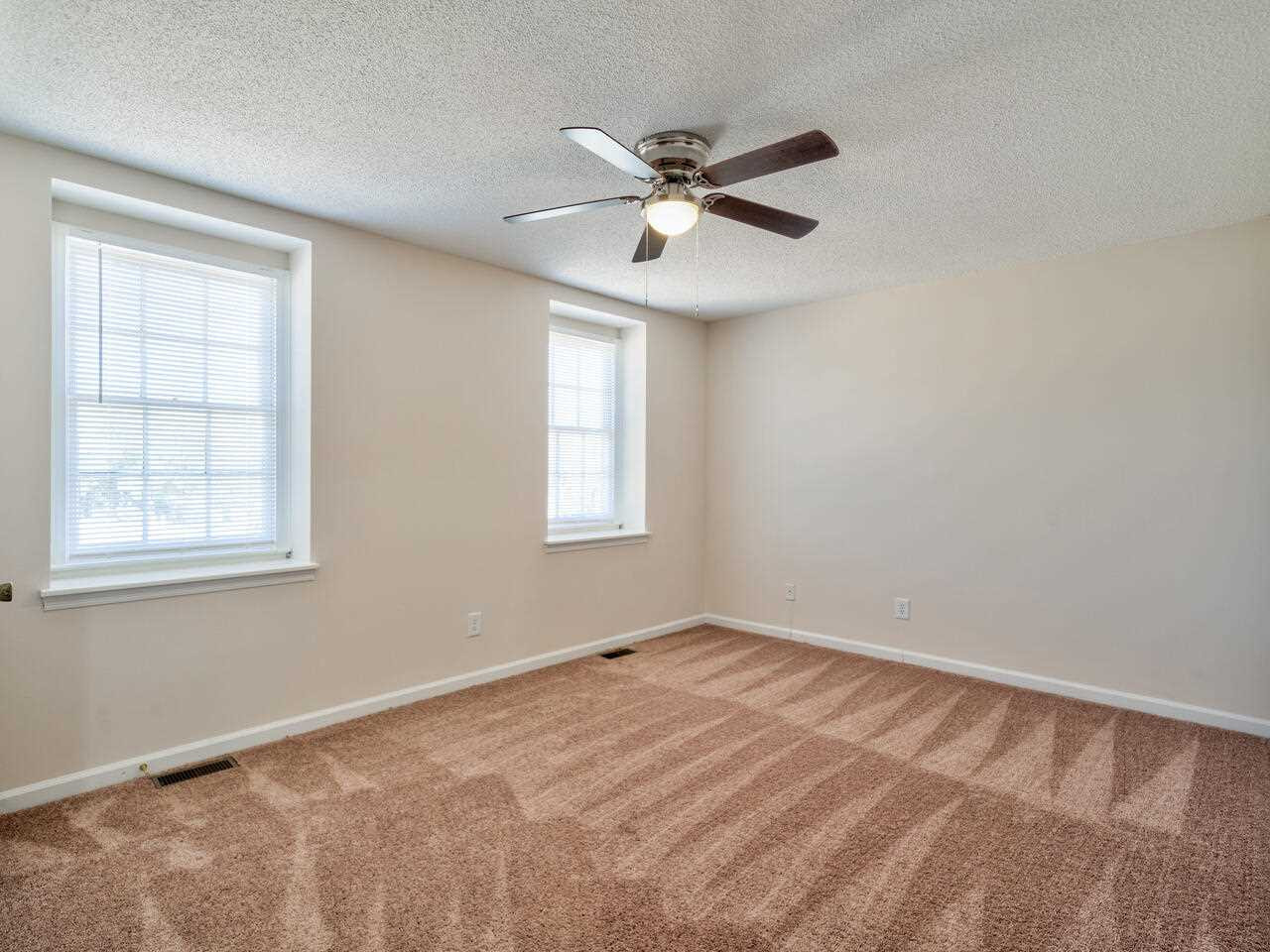 2220 New Hope Church Road Raleigh, NC 27604 - Photo 17 of 30 a view of an empty room with a window