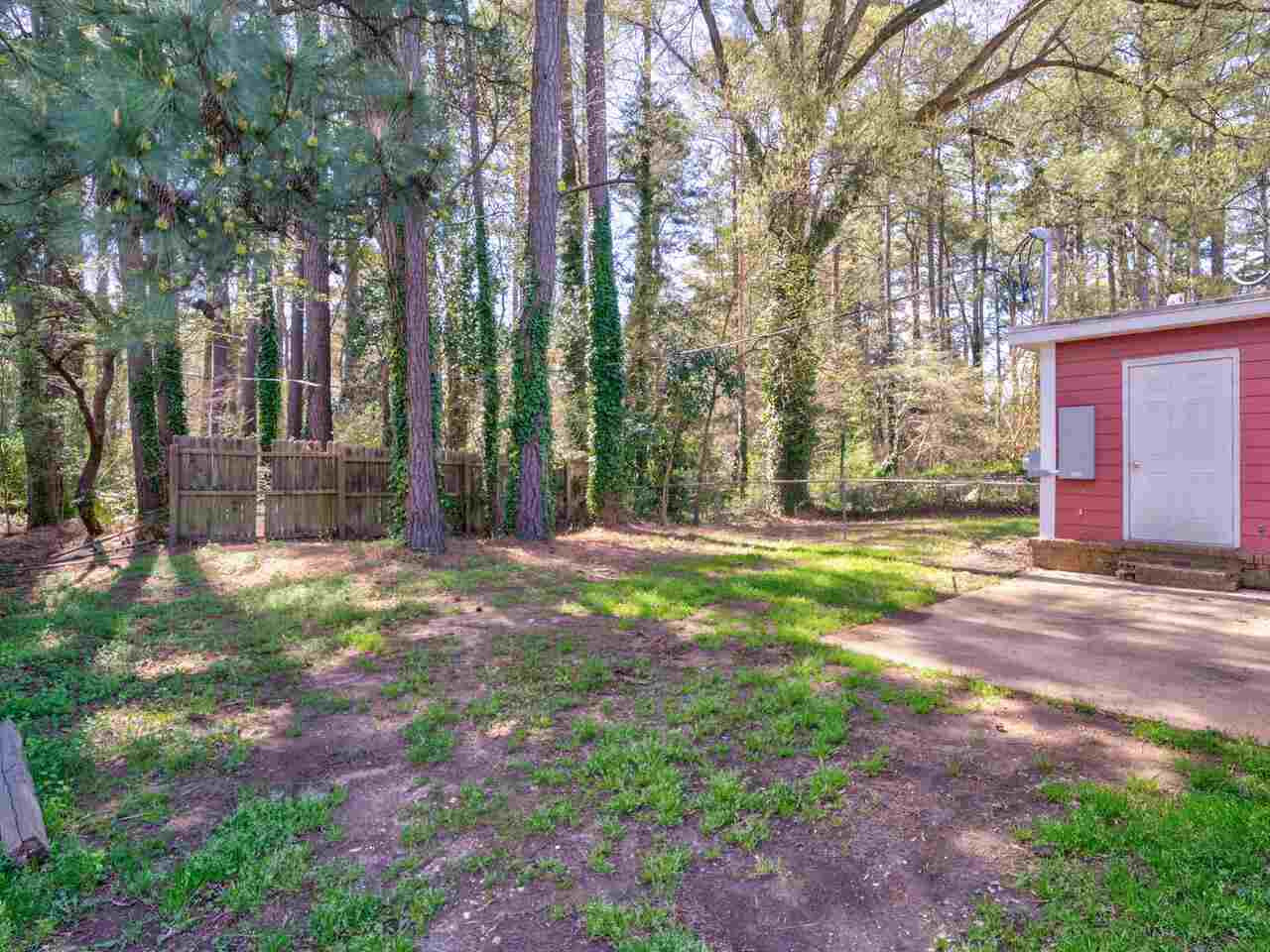 2220 New Hope Church Road Raleigh, NC 27604 - Photo 24 of 30 a view of a house with backyard and tree