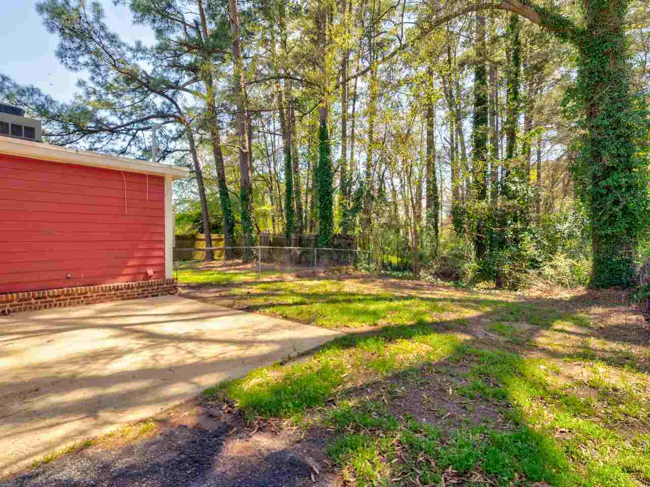 2220 New Hope Church Road Raleigh, NC 27604 - Photo 29 of 30 a view of a house with a yard and tree s