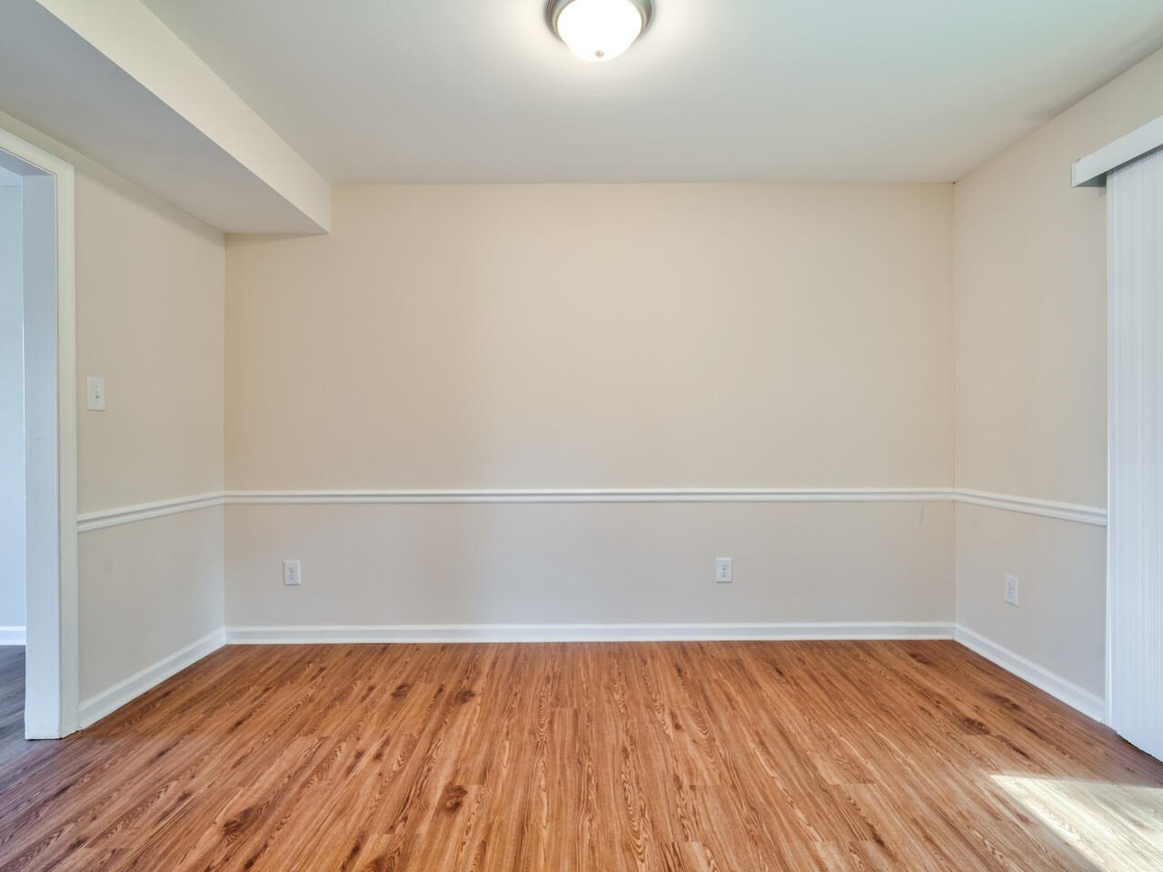 2220 New Hope Church Road Raleigh, NC 27604 - Photo 10 of 30 a view of a room with wooden floor