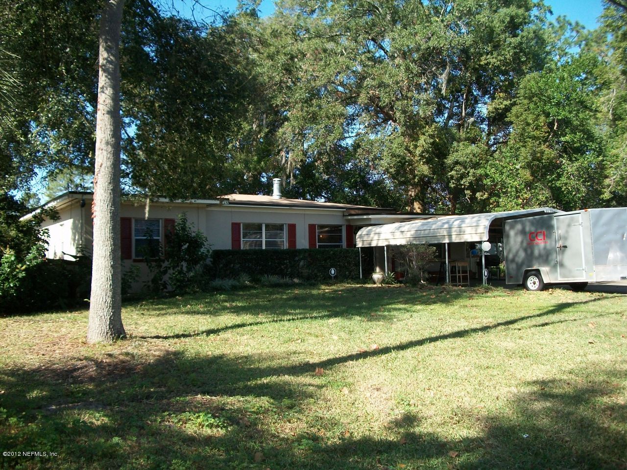 6038 Stetson Road Jacksonville, FL 32217 - Photo 3 of 55 a view of a house with a yard