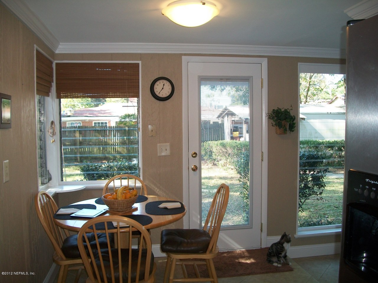6038 Stetson Road Jacksonville, FL 32217 - Photo 35 of 55 a view of a dining room with furniture window and outside view