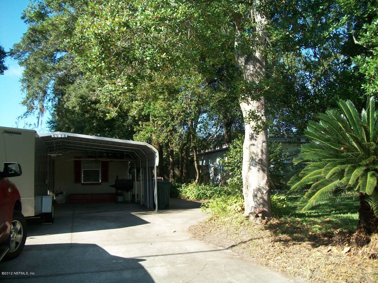 6038 Stetson Road Jacksonville, FL 32217 - Photo 5 of 55 a front view of a house with a yard
