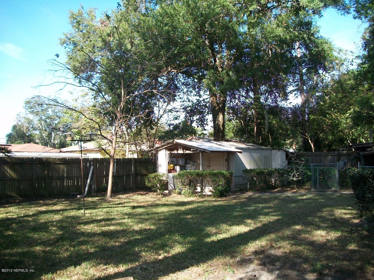 6038 Stetson Road Jacksonville, FL 32217 - Photo 7 of 55 a view of a house with backyard and a patio
