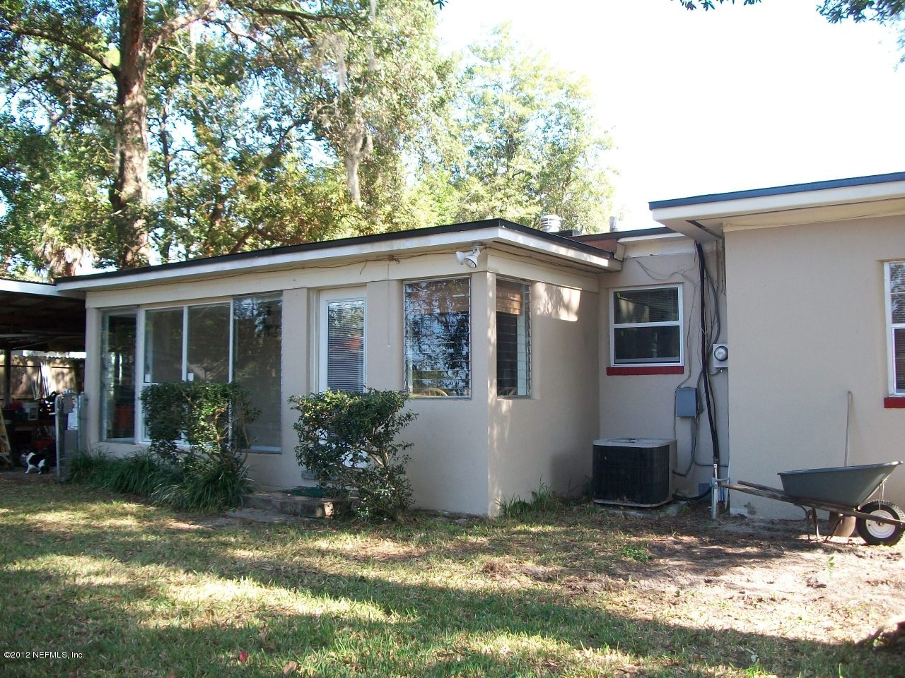 6038 Stetson Road Jacksonville, FL 32217 - Photo 9 of 55 a view of a house with a yard