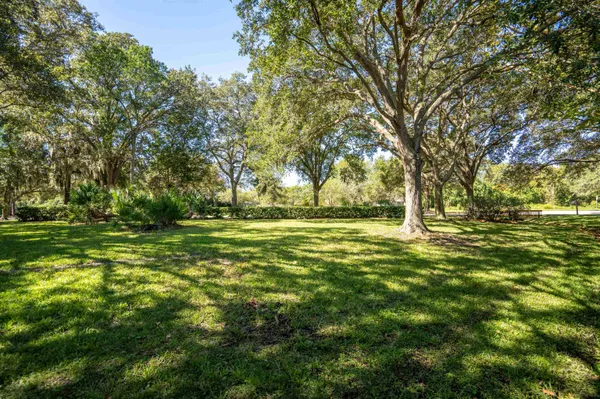 a view of a patio with a yard