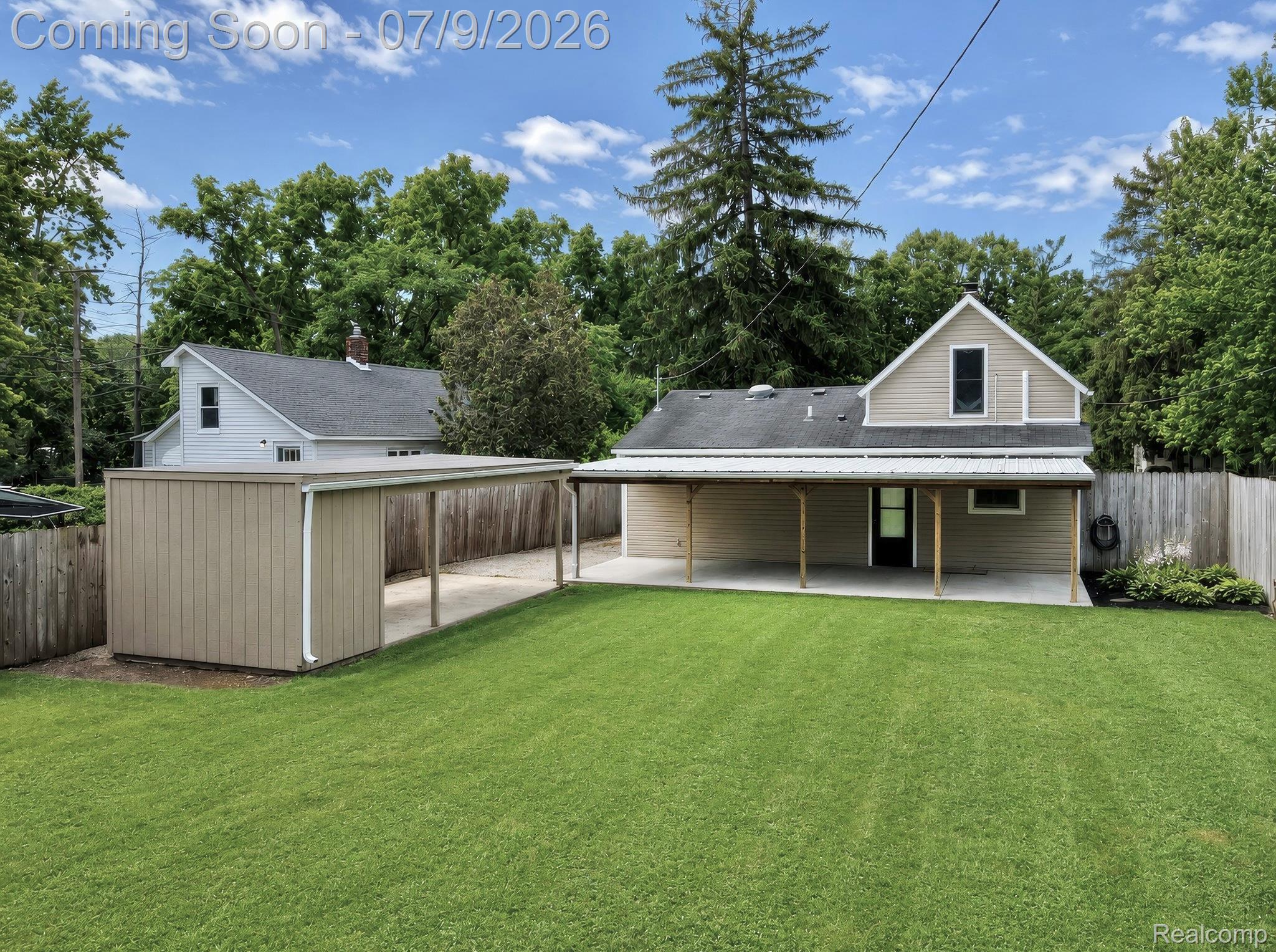 610 Quarter Street Rochester, MI 48307 - Photo 4 of 43 Large backyard with carport and enclosed storage