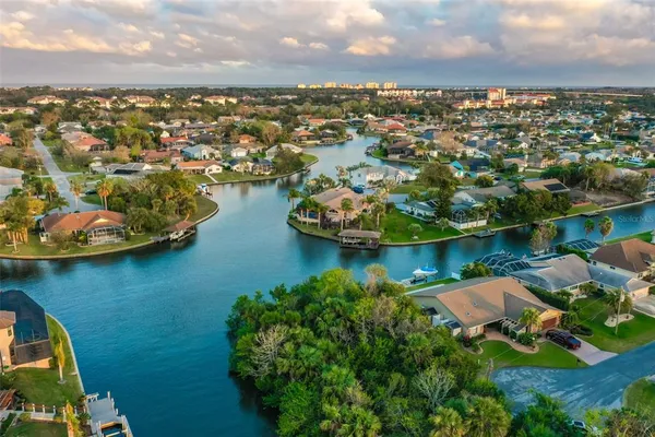 an aerial view of residential houses with outdoor space