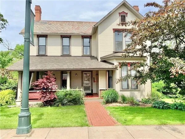 a front view of house with yard