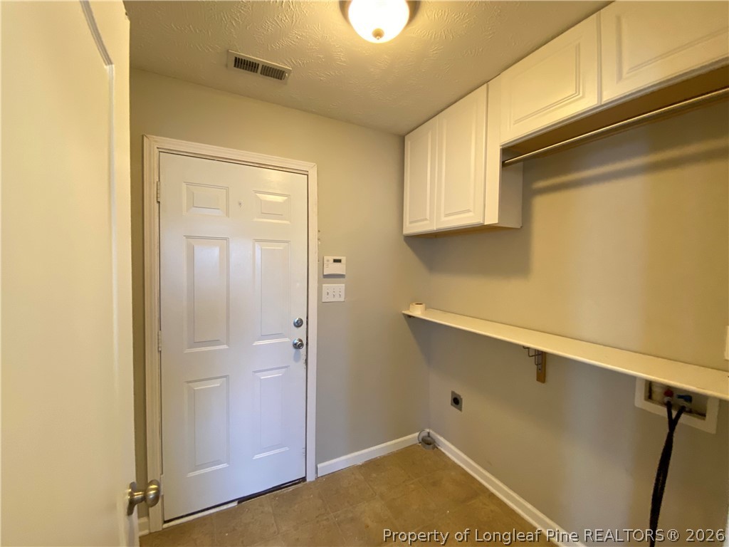 58 Polk Street Spring Lake, NC 28390 - Photo 18 of 26 a bathroom with a sink