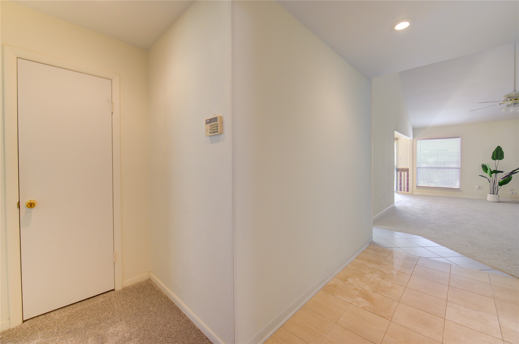 1927 Ash Meadow Drive Houston, TX 77090 - Photo 38 of 50 a view of hallway with window and wooden floor