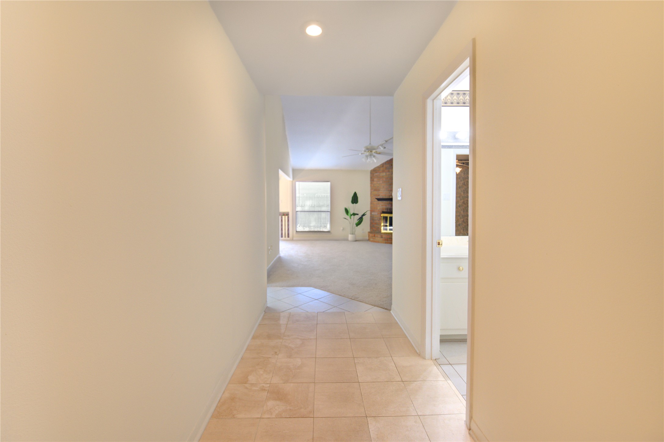 1927 Ash Meadow Drive Houston, TX 77090 - Photo 39 of 50 a view of a hallway with a view of living room