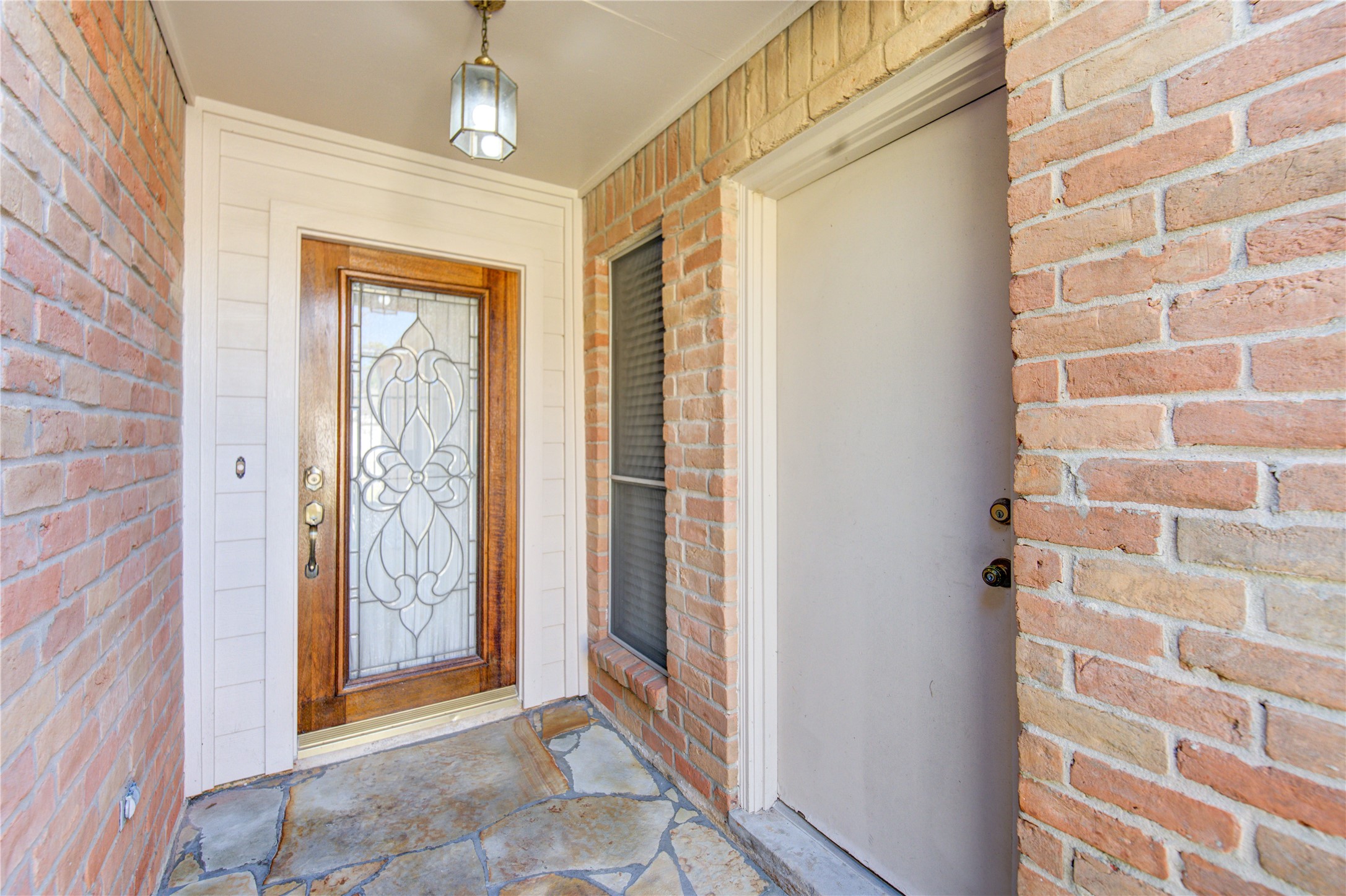 1927 Ash Meadow Drive Houston, TX 77090 - Photo 41 of 50 a view of entryway with a front door and wooden floor