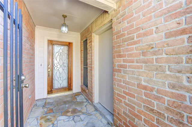 a view of a bathroom with a shower curtain