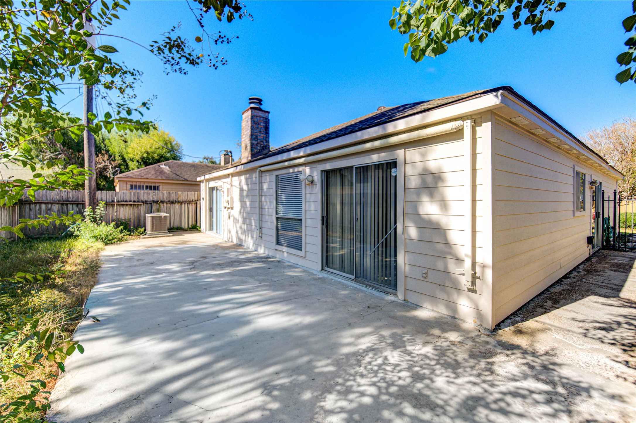1927 Ash Meadow Drive Houston, TX 77090 - Photo 44 of 50 a view of house with backyard and trees in the background