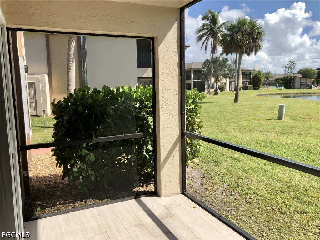 16881 Davis Road, Unit 214 Fort Myers, FL 33908 - Photo 29 of 46 a picture of a yard and swimming pool