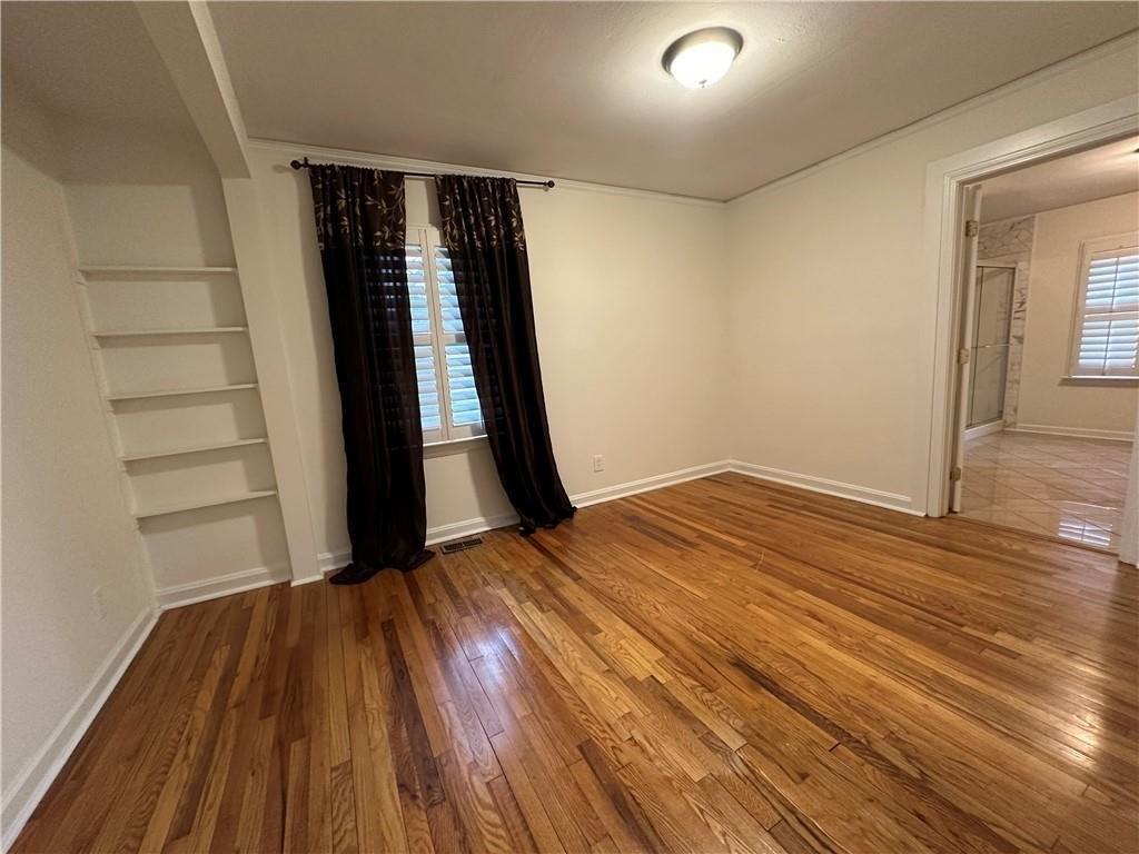 4641 Due W Road Northwest Kennesaw, GA 30152 - Photo 12 of 38 wooden floor in an empty room with a window