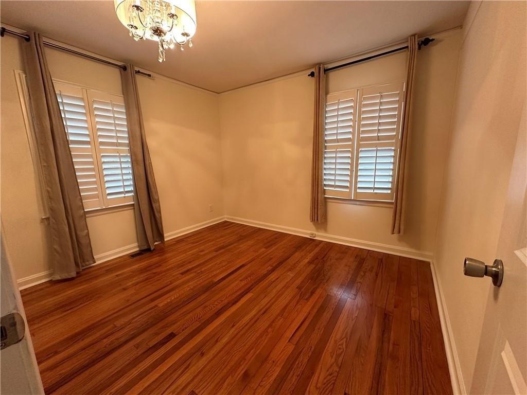 4641 Due W Road Northwest Kennesaw, GA 30152 - Photo 20 of 38 a view of an empty room with wooden floor and a window