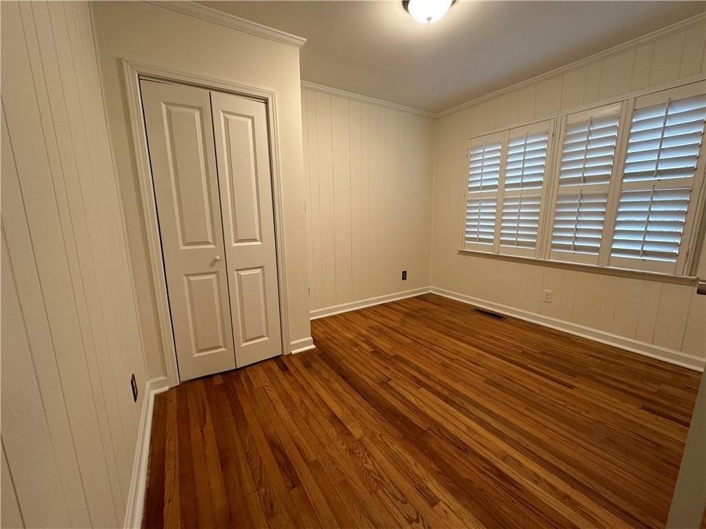 4641 Due W Road Northwest Kennesaw, GA 30152 - Photo 22 of 38 a view of a room with wooden floor and cabinet