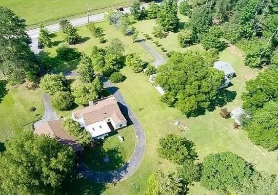 4641 Due W Road Northwest Kennesaw, GA 30152 - Photo 28 of 38 an aerial view of a house with a yard