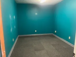 a view of a room with a fan