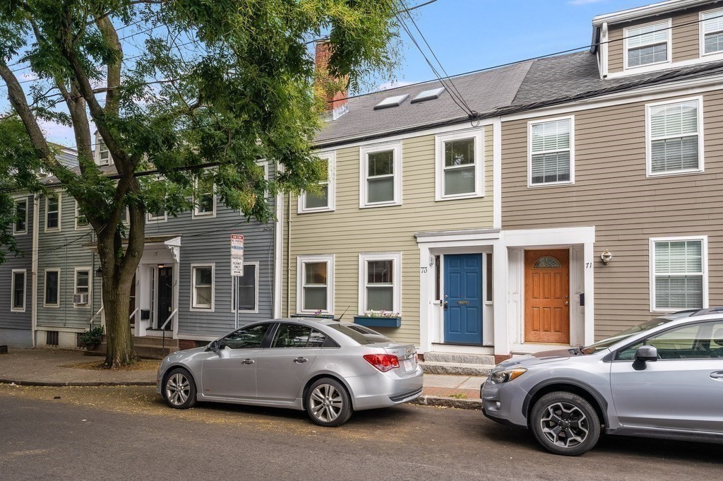 73 Gore Street Cambridge, MA 02141 - Photo 1 of 41 a car parked in front of a house
