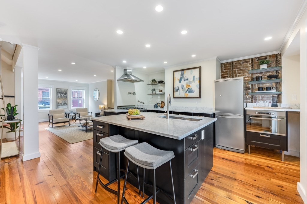 73 Gore Street Cambridge, MA 02141 - Photo 11 of 41 a kitchen with counter space and appliances